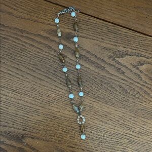 Elegant Beaded Necklace with White and Brown Accents